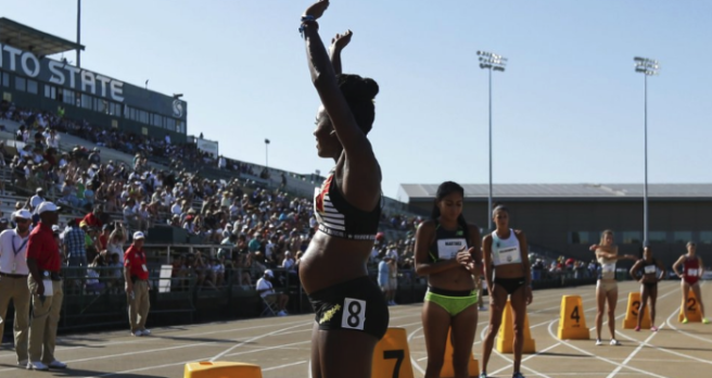 Pregnant athlete wears Wonder Woman top and she’s our QUEEN
