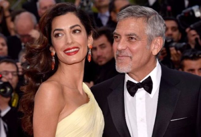 George and Amal Clooney seek legal action over pap pics of twins