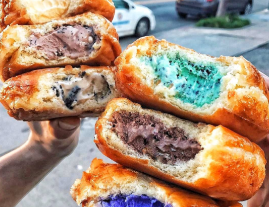 Someone has created an ice-cream filled donut and we are in LOVE